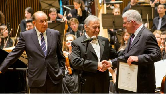 Maestro Zubin Mehta congratulates Head of the Buchmann-Mehta School of Music Prof. Zeev Dorman (right) as TAU benefactor Josef Buchmann looks on  