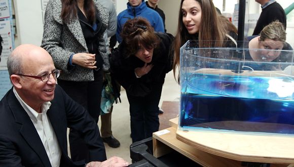 President Klafter checks out a science display on the TAU campus
