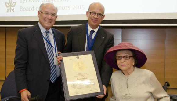Raya Jaglom receives a certificate 